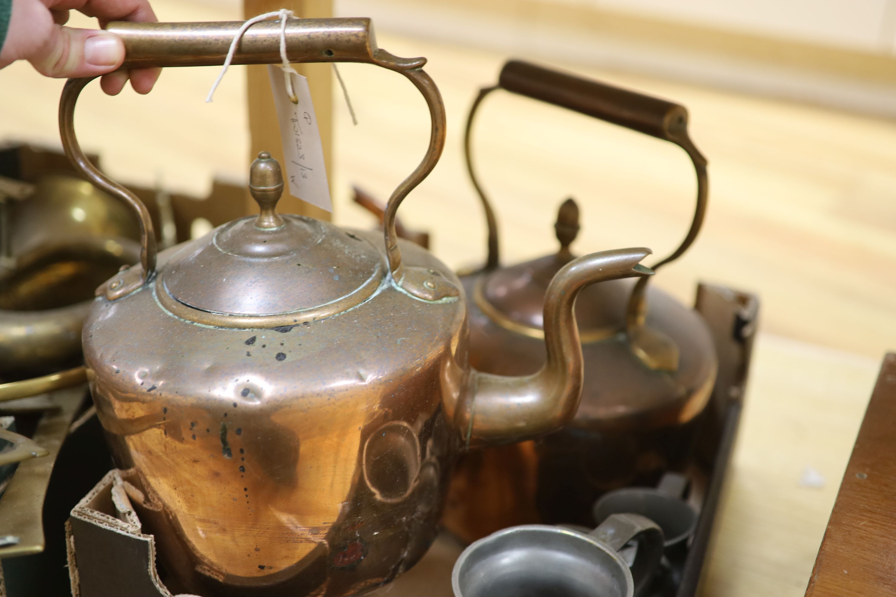 Miscellaneous metalware, including two Eastern copper kettles, pewter measures, chestnut roaster etc.